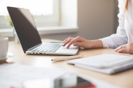 business-woman-working-on-laptop-in-her-office-picjumbo-com-1024x683-1-464x309